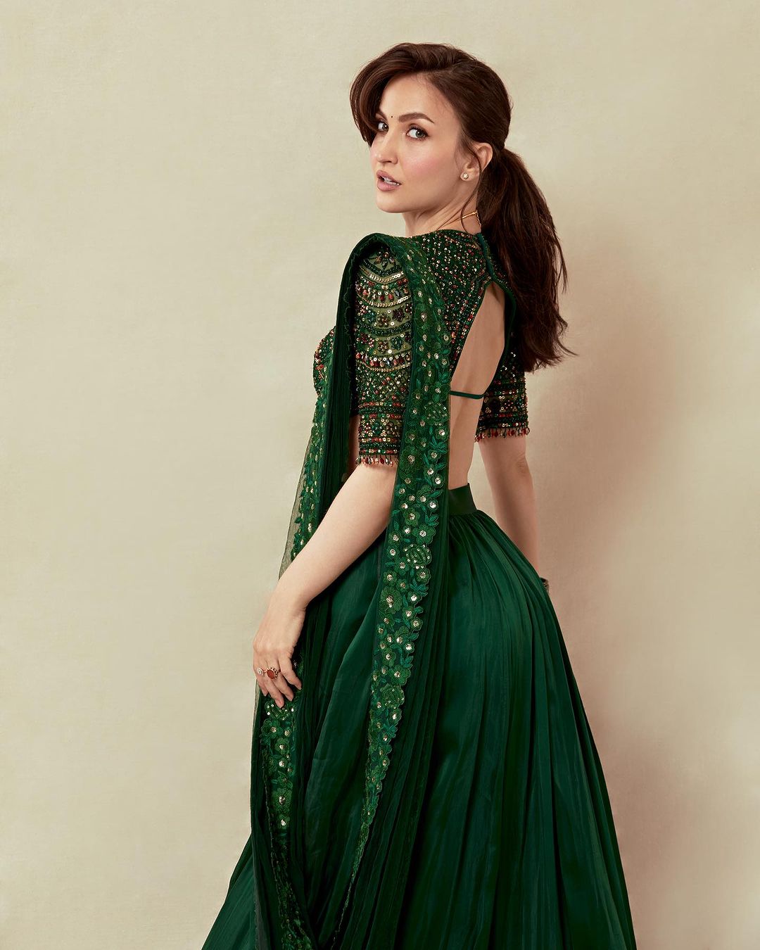 Mumbai Actress Elli AvrRam Images in Green Lehenga Choli